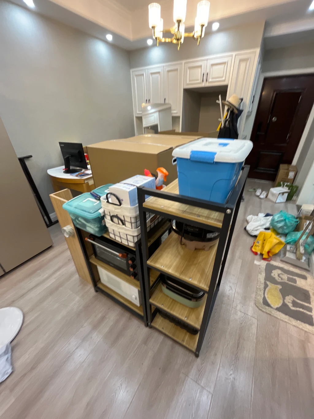 A dining area full of packed belongings A dining area full of packed belongings